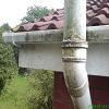 utter and downpipe covered in dirt